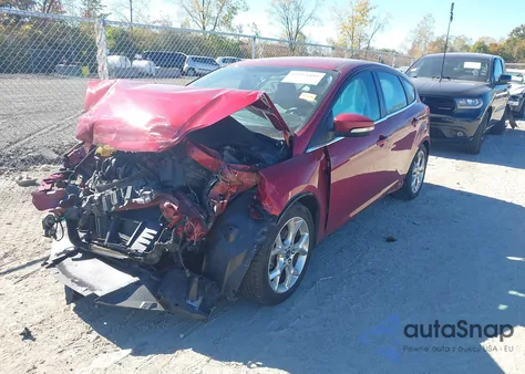 2014 Ford Focus Titanium z USA, uszkodzony, nr VIN 1FADP3N23EL148874